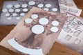 Blank family tree charts on wooden table, closeup Royalty Free Stock Photo