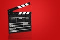 Blank Film clapper board or movie clapper cinema board , Slate film on red background .cinema concept clipping path included Royalty Free Stock Photo