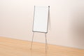 Blank flip chart standing Royalty Free Stock Photo