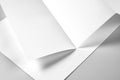 Blank Folded Letterhead or Flyer over Stack of Letterheads