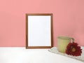 Blank frame mockup on coral background Royalty Free Stock Photo