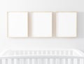 Blank Frame Nursery Mockup with baby cot Royalty Free Stock Photo