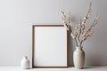 Blank Frame With Spring Bouquet With Willow In Vase Next To It On White Background. Generative AI