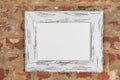 Blank framed picture on a wall