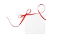 Blank gift tag with satin ribbon on white background Royalty Free Stock Photo