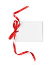 Blank gift tag with satin ribbon on white background Royalty Free Stock Photo