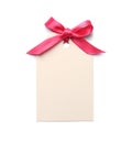 Blank gift tag with satin ribbon on white background Royalty Free Stock Photo