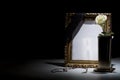 Blank gilded mourning frame with bronze vase, white rose,rosary Royalty Free Stock Photo