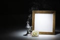 Blank gilded picture frame with thurible and white rose Royalty Free Stock Photo