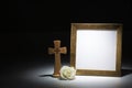 Blank gilded picture frame, white rose and crucifix Royalty Free Stock Photo