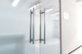 Blank glass door with metal handles mock up, Royalty Free Stock Photo