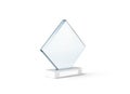 Blank glass trophy mockup stand on clear marble base,