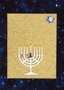 Blank gold Hanukkah greeting card with menorah on stars