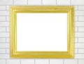 Blank golden frame on brick stone wall background Royalty Free Stock Photo