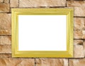 Blank golden frame on brick stone wall Royalty Free Stock Photo