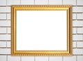 Blank golden frame on brick stone wall Royalty Free Stock Photo