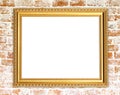 Blank golden frame on brick stone wall Royalty Free Stock Photo
