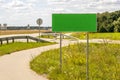 Blank  green billboard or road sign on the highway Royalty Free Stock Photo