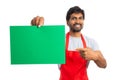 Blank green paper held by supermarket employee