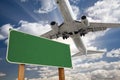 Blank Green Road Sign and Airplane Above Royalty Free Stock Photo