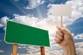Blank Green Road Sign and Man Holding Poster Royalty Free Stock Photo