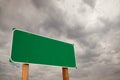 Blank Green Road Sign Over Storm Clouds Royalty Free Stock Photo