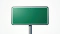 Blank green road sign on pole against white background. Ready for custom text and graphics for direction or information. Empty Royalty Free Stock Photo