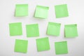 blank green sticky notes mockup on white background. pastel green sticky notes with things to do on office board. Mockup sticky Royalty Free Stock Photo