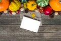 Blank greeting card and envelope with Thanksgiving Autumn Fall background with harvested pumpkins, apples, nuts Royalty Free Stock Photo