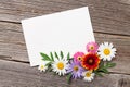 Blank greeting card and flowers Royalty Free Stock Photo