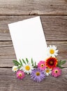 Blank greeting card and flowers Royalty Free Stock Photo