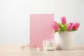 Blank greeting card, tulips and gift on table. Happy Mother`s day Royalty Free Stock Photo