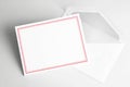 Blank greeting or thank you card with red frame and envelope