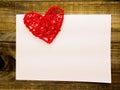 Blank greetings with Valentine`s day, women`s day, on wooden background with red heart and flowers