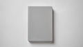 Blank grey tissular hard cover book mock up, front side view, 3d rendering. Empty notebook hardcover mockups, isolated
