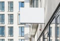 Blank hanging outdoor business wall sign