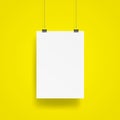 Blank Hanging poster with clip and wire mockup vector on yellow