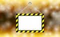 Blank hanging warning sign on bokeh gold background, template hanging label frame for copy space, hangtags empty label, hanging
