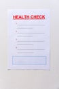 A blank health check form with text and lined copy space. Royalty Free Stock Photo