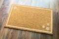 Blank Holiday Welcome Mat With Snow Flakes On Wood Floor Background Royalty Free Stock Photo