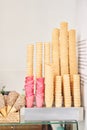 blank ice cream wafers. Waffle cones in an ice-cream shop, Italy. A variety of sugar-free vegan ice cream with natural Royalty Free Stock Photo