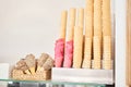 blank ice cream wafers. Waffle cones in an ice-cream shop, Italy. A variety of sugar-free vegan ice cream with natural Royalty Free Stock Photo