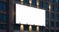Blank Illuminated Billboard Mockup on Modern Brick Building at Night Royalty Free Stock Photo