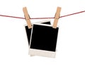 Blank instant photos hanging on the clothesline