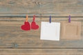 blank instant photos hanging on the clothesline with red heart Royalty Free Stock Photo