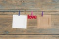 blank instant photos hanging on the clothesline with word love Royalty Free Stock Photo