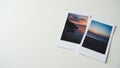 Blank instant photos, slightly faded, on clean white surface, design, light Royalty Free Stock Photo