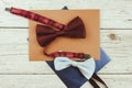 Blank invitation or greeting card and envelope, wedding card with bowtie Royalty Free Stock Photo