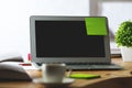 Blank laptop with green sticker Royalty Free Stock Photo