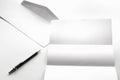 blank of letter paper and white envelope with pen Royalty Free Stock Photo